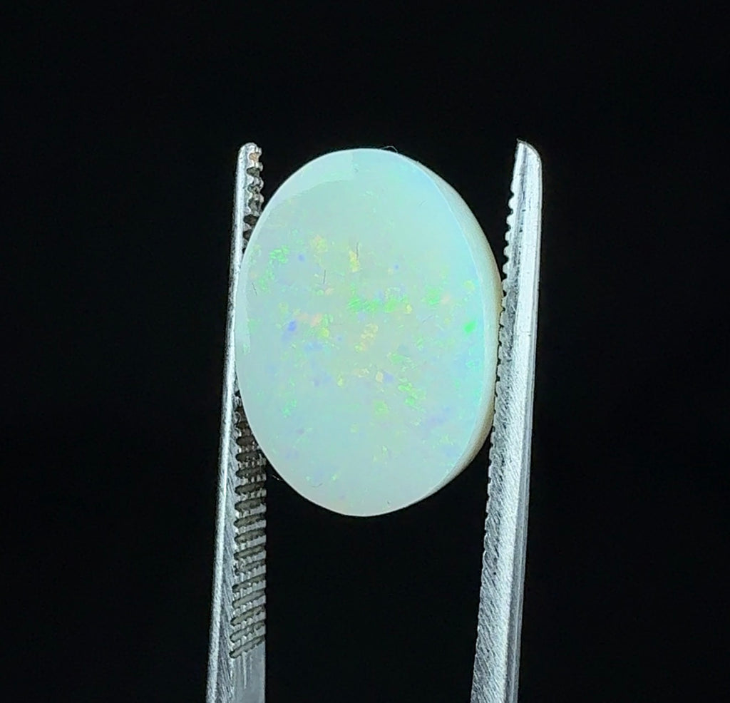 Auction Win: Opal (Fluorescent/Phosphorescent, Lab-Grown) 4.9ct