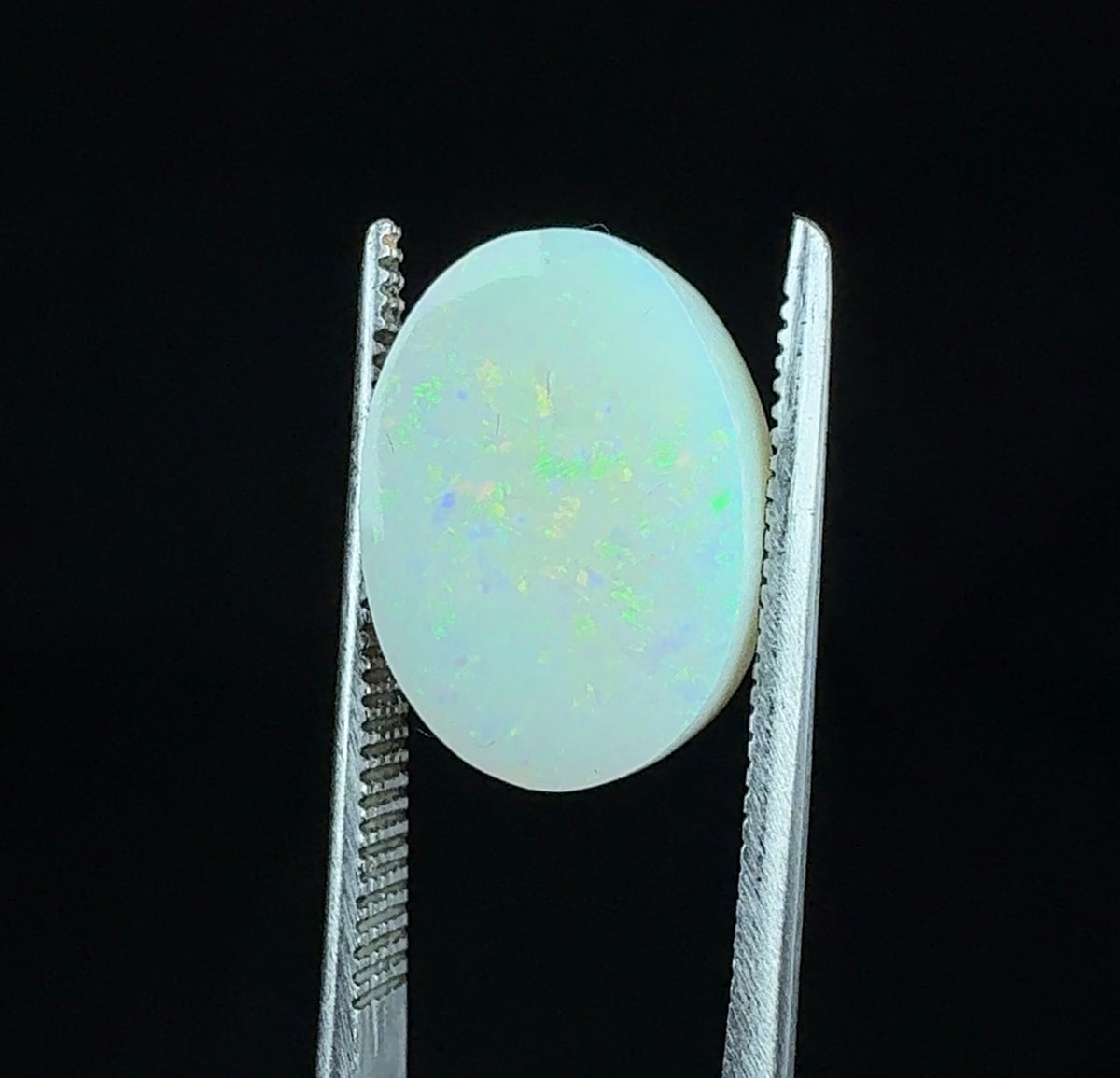 Auction Win: Opal (Fluorescent/Phosphorescent, Lab-Grown) 4.9ct