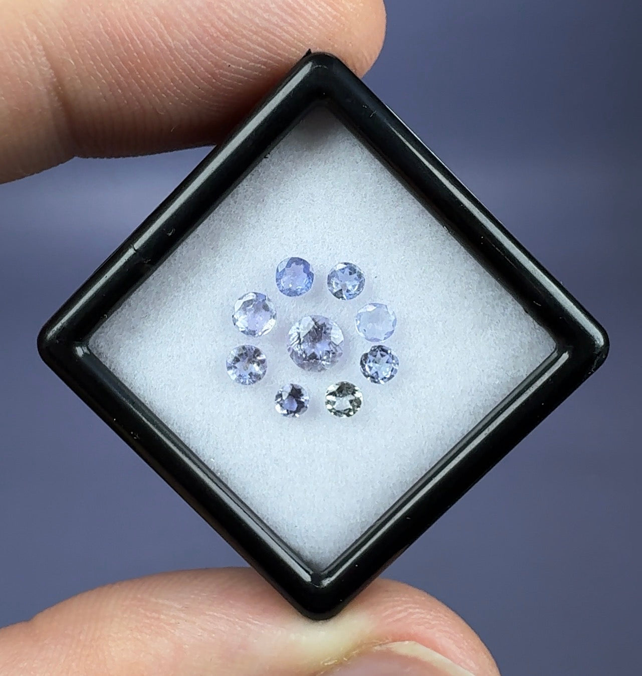 Auction Win: Tanzanite 9-stone Set .82cttw