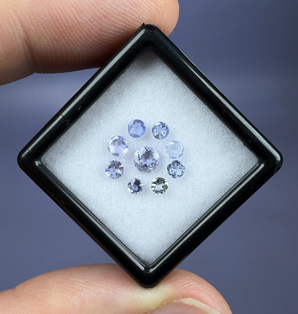Auction Win: Tanzanite 9-stone Set .82cttw