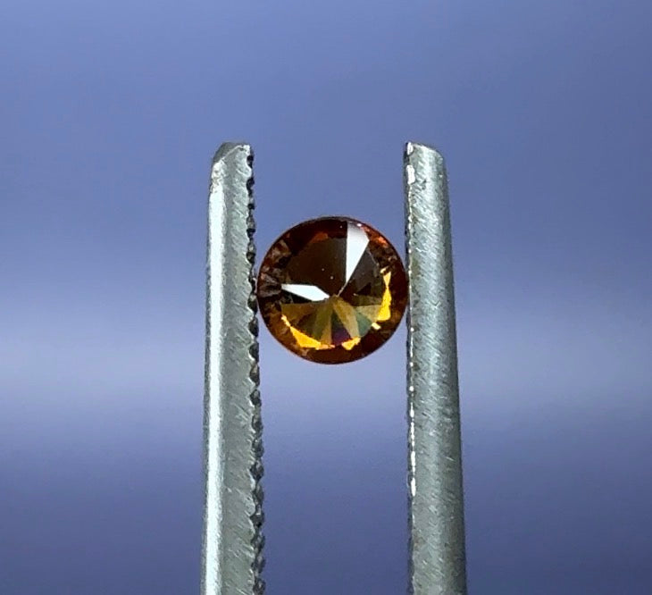 Auction Win: Imperial Zircon (great color!) .37ct