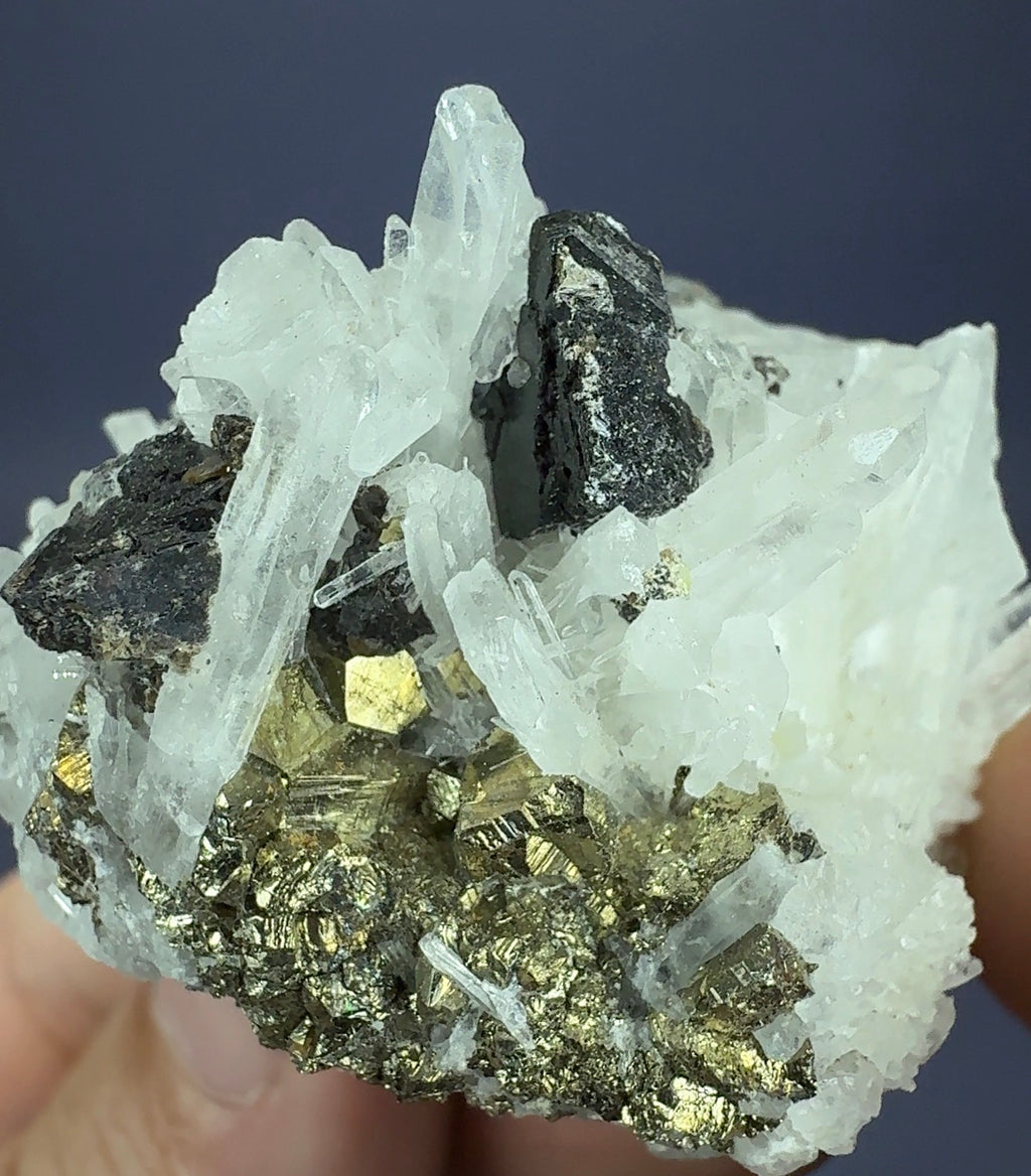 Auction Win: Quartz with Hübnerite and Pyrite (pyrotohedron)