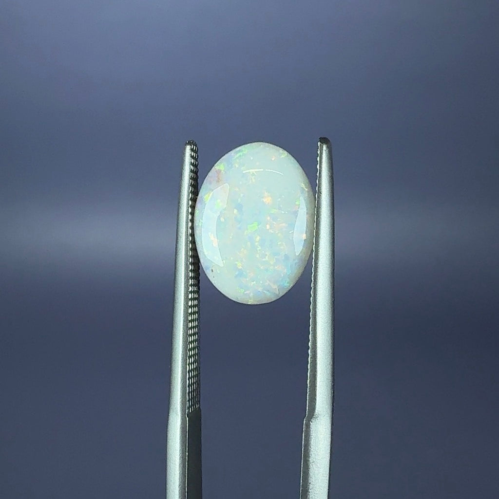 Auction Win: White Opal (phosphorescent!) 1.57ct