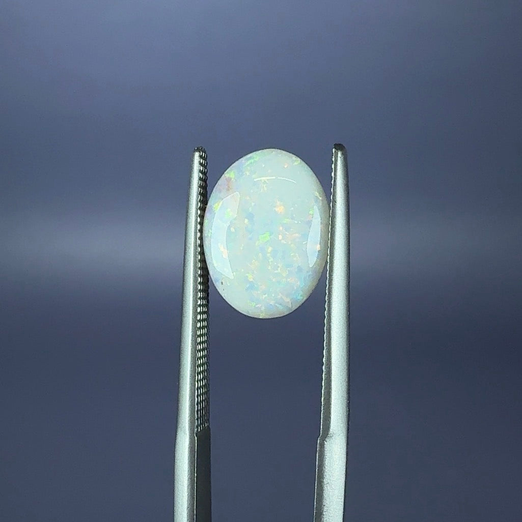 Auction Win: White Opal (phosphorescent!) 1.57ct