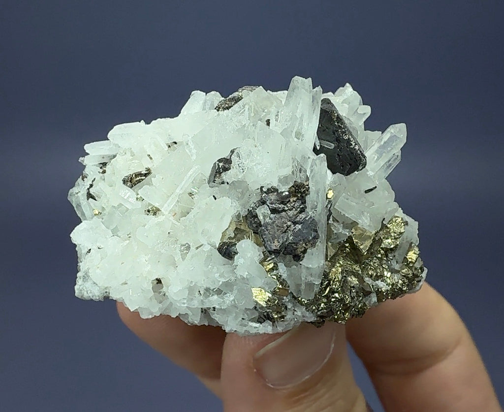 Auction Win: Quartz with Hübnerite and Pyrite (pyrotohedron)