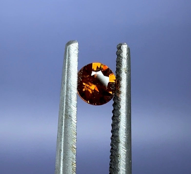Auction Win: Imperial Zircon (great color!) .37ct