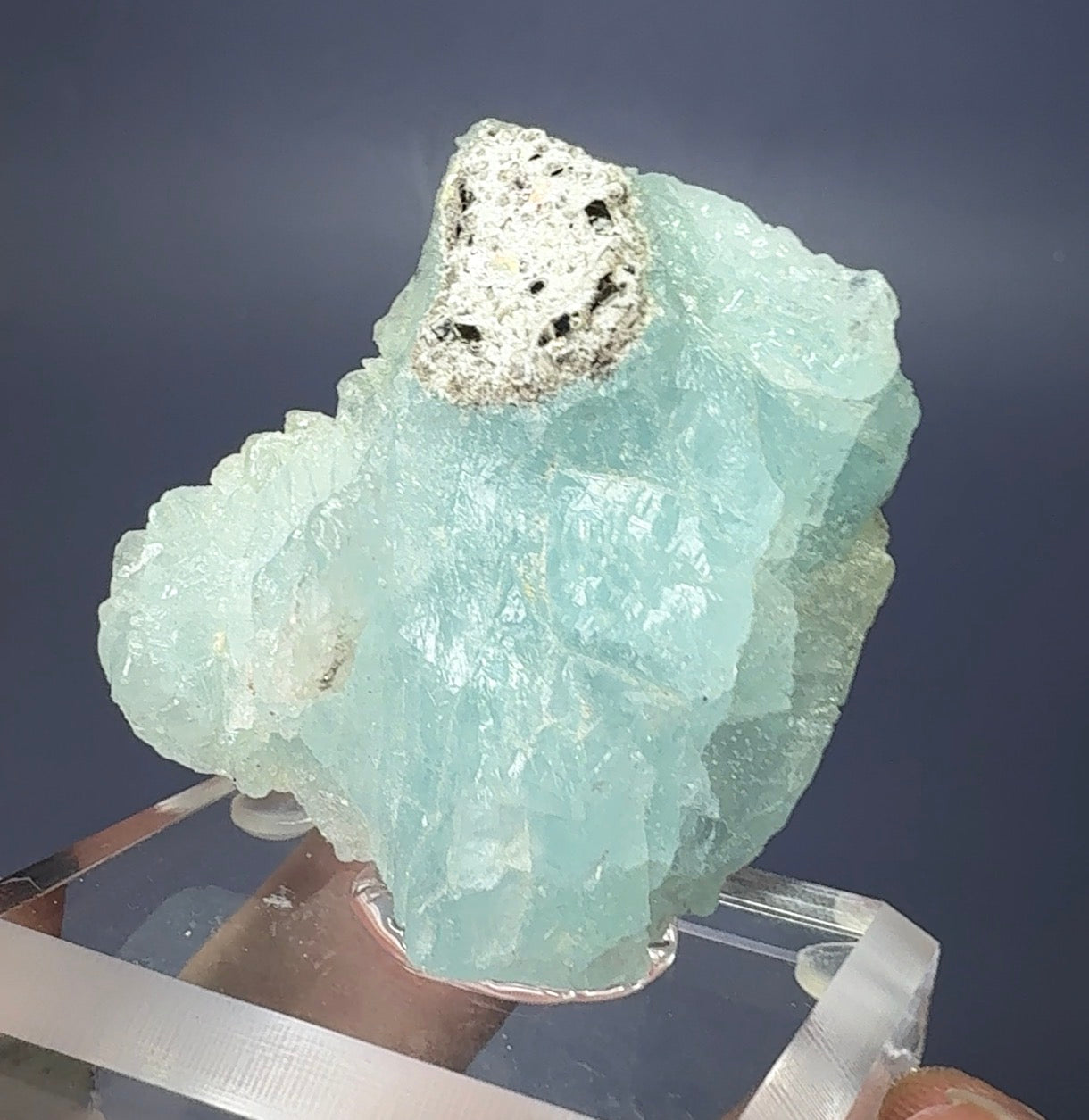 Auction Win: Etched Blue Topaz w/ Muscovite (natural color)